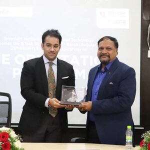 Mr. Raghavendra Kulkarni, Global Delivery Head at Cognizant, addresses participants at the Orientation Program '23.
