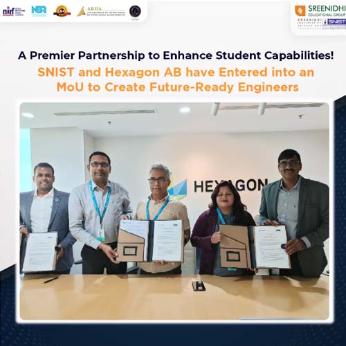 Prof. C.V. Tomy and Dr. Shruti Bhargava Choubey exchanging MoU documentation with Hexagon Capability Center India officials.